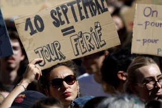 Les actions de blocage annoncées pour mercredi sont restées relativement limitées en matinée. KEYSTONE/EPA/GUILLAUME HORCAJUELO